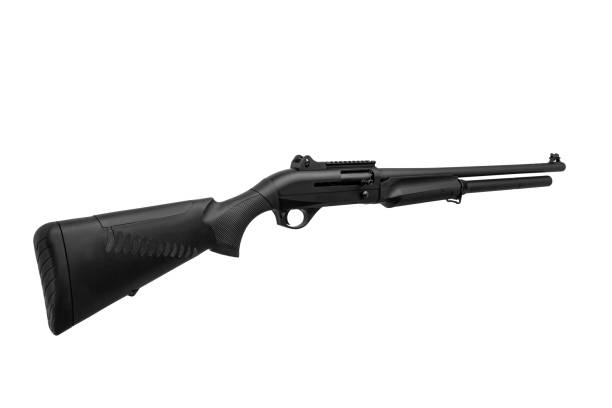 istock Modern semi-automatic shotgun. Weapons for sports and hunting. Black weapon isolate on white background. 1390336538