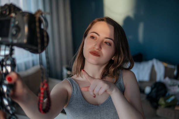 istock Vlogger young woman 1390339527