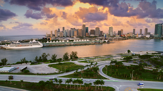 Aerial view of Watson Island and overlooking Port of Miami and Downtown during sunrise, Florida, USA.