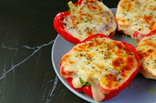 Closeup of Fresh Cooked Homemade Stuffed Bell Peppers or Dolma with Melting Cheese