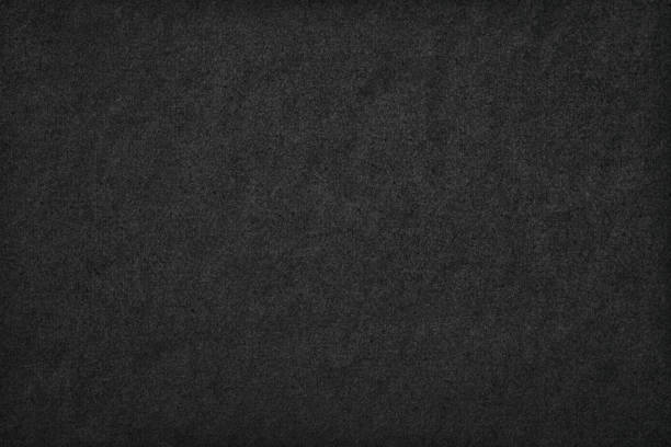 istock black background, paper texture similar to concrete wall 1390349008