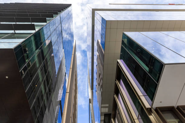 istock Low angle view of modern office buildings, skyscrapers, background with copy space 1390353132