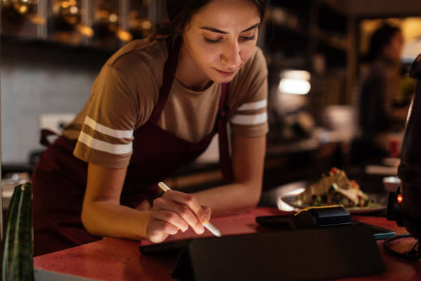 istock Close Up Of Waitress Working 1390362743