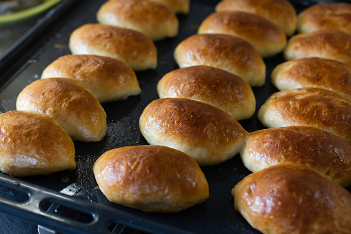 Pies just from oven. Closeup, selective focus