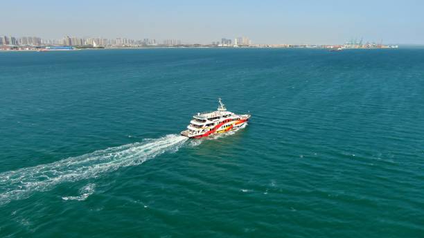 istock Passenger ship sailing on the blue sea 1390373784