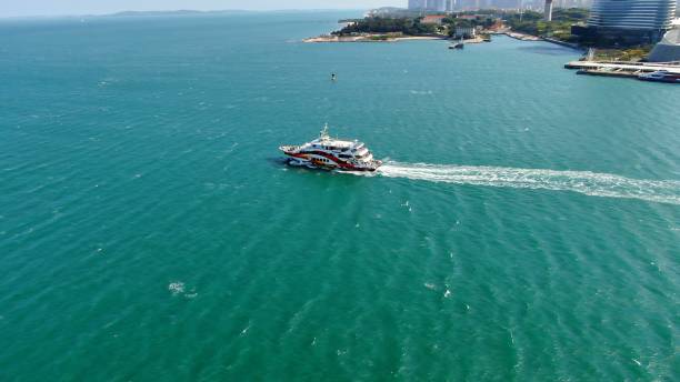 istock Passenger ship sailing on the blue sea 1390373786