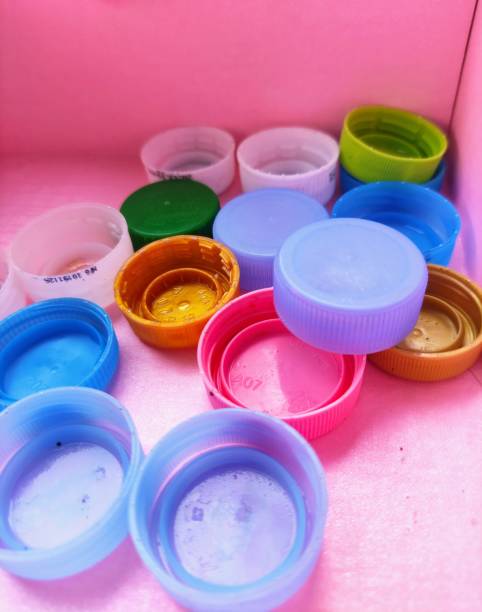 istock A group of plastic bottle closure waste. 1390375585