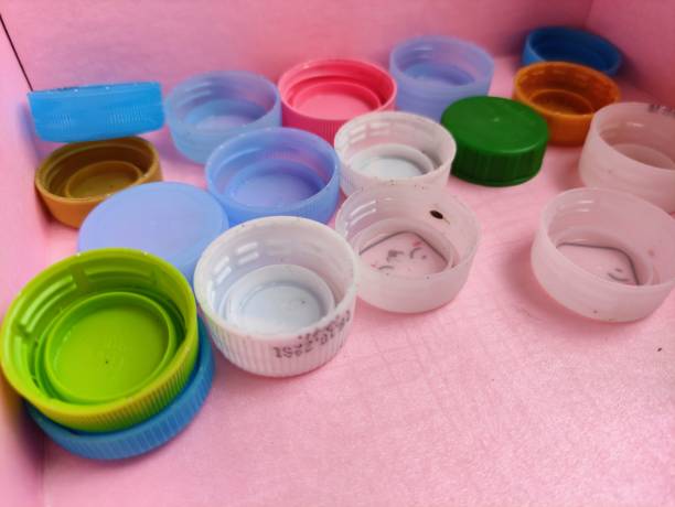 istock A group of plastic bottle closure waste. 1390375594