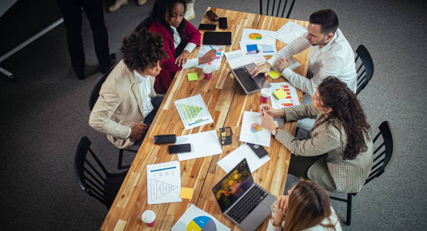 istock Teamwork of a diverse group of architects working on the project. 1390378287