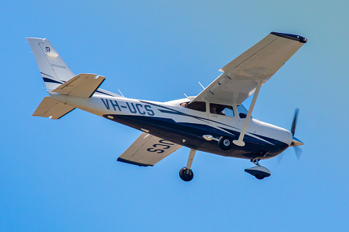 This image is of a 2011 Cessna 182 turbo landing at Brisbane Archerfield airport. The aircraft, registered VH-UCS is conducting touch and goes at the aerodrome.