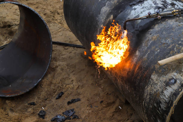 istock Working with gas cutting requires special skill to cut pipes with fire. 1390378511