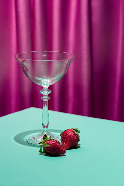 istock Cocktail Glass on colorful background. Copy space. 1390385561