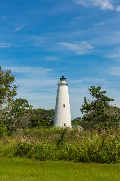 Morning Light Ocracoke Light is the oldest operating light station in North Carolina and the second oldest lighthouse still standing in the state. ocracoke lighthouse stock pictures, royalty-free photos & images