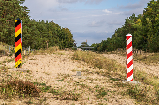 The no man's land on the border between Ahlbeck in Germany and Swinoujscie in Poland with two boundary posts