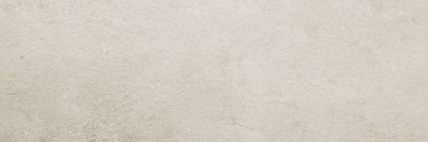 istock Brown concrete stone surface paint wall background, Grunge cement paint texture backdrop, Brown rough concrete stone wall background, Copy space for interior design background, banner, wallpaper 1390409472