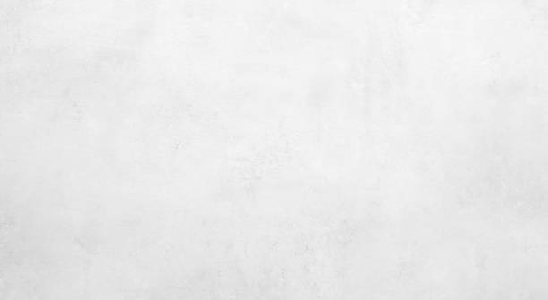 istock White concrete stone surface paint wall background, Grunge cement paint texture backdrop, White rough concrete stone wall background, Copy space for interior design background, banner, wallpaper 1390409602