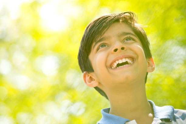 istock Joyful boy at the park 1390416636