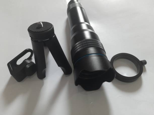 scatta immagini mozzafiato di oggetti estremamente lontani con questo teleobiettivo zoom 36x con treppiede per smartphone di apexel. - telephoto lens flash foto e immagini stock