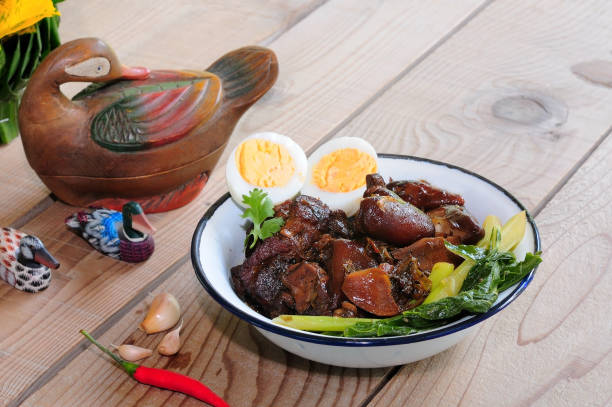 istock Dried stewed pork, served with boiled egg 1390419863