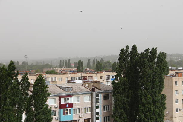 istock Dust storm over the city and the dust pollution 1390427268