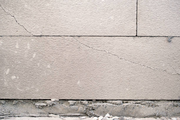 istock lightweight brick wall The subsidence caused cracking and collapse 1390429766