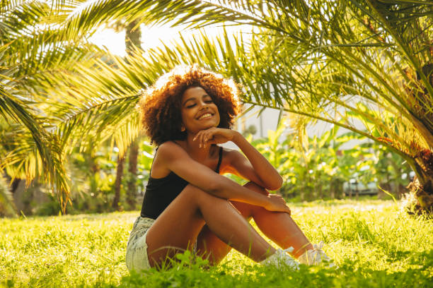 istock Pretty young afro woman 1390431246