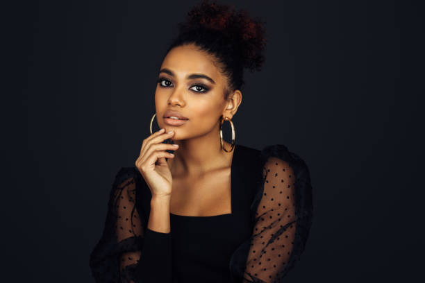 istock Beautiful afro woman with perfect make-up 1390432139