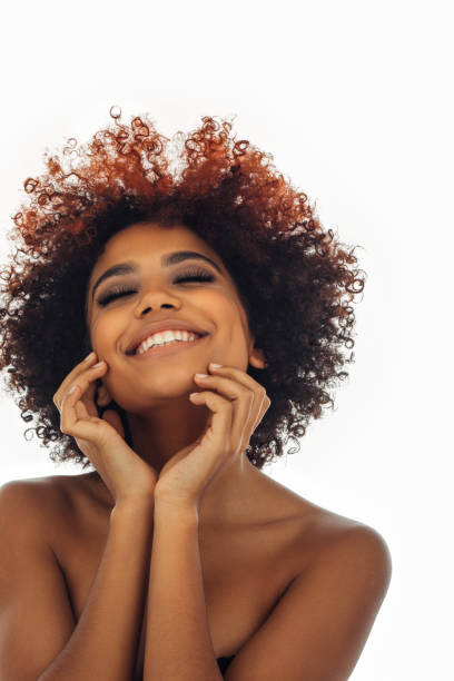 istock Beautiful afro woman with perfect make-up 1390432165