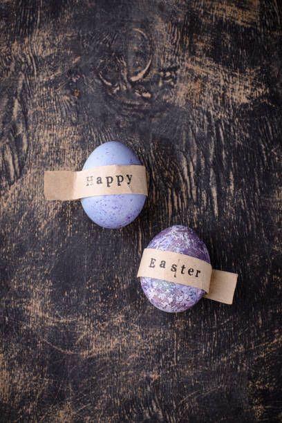 istock Festive Easter eggs in purple and blue color 1390433124
