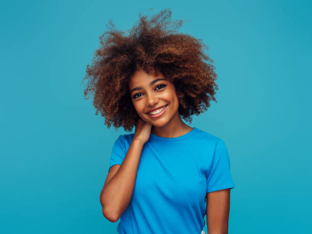 istock Beautiful afro woman 1390433259