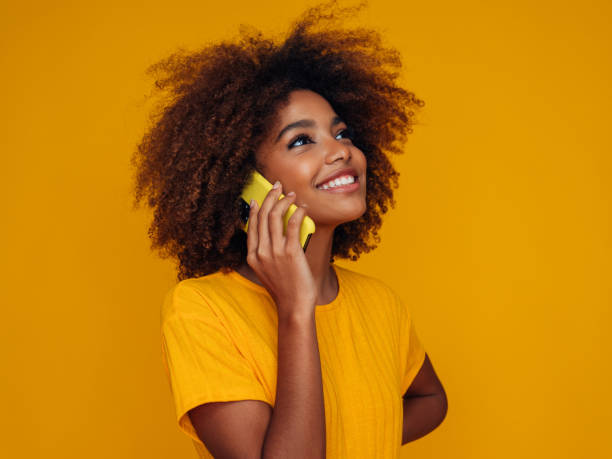 istock Woman holding a smart phone 1390433330