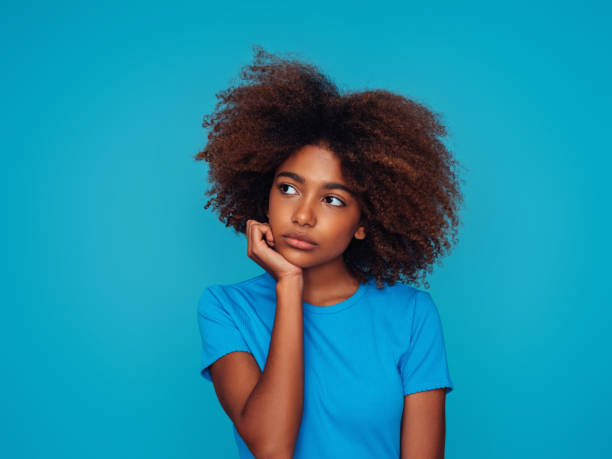 istock Beautiful girl with curly hairstyle 1390433401