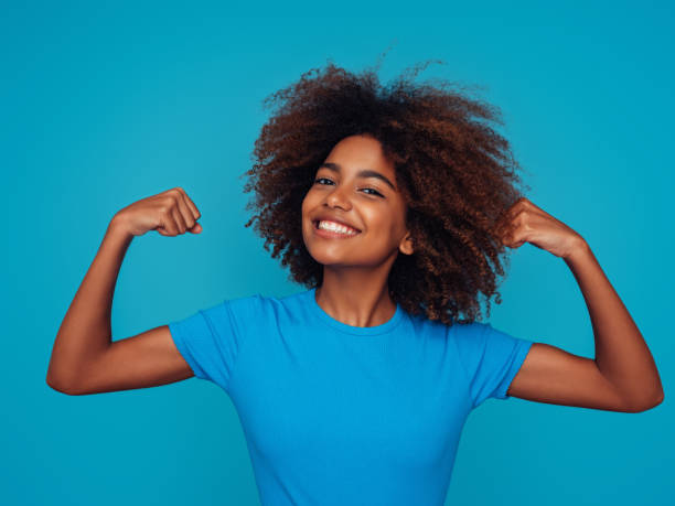 istock Beautiful girl with curly hairstyle 1390433439
