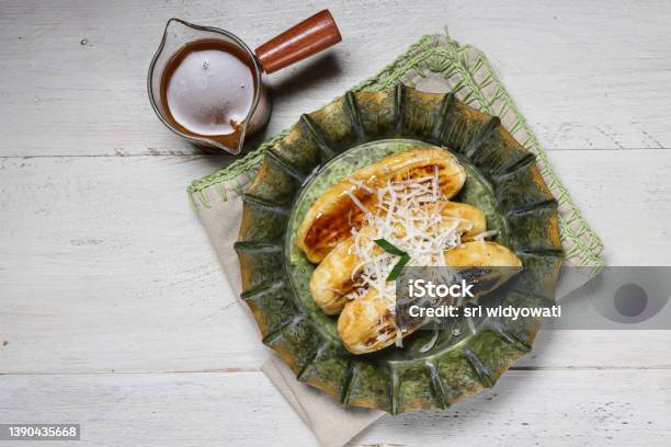 Pisang Gapit Or Pisang Epe Is Grilled Banana With Coconut Brown Sugar Sauce Stock Photo - Download Image Now