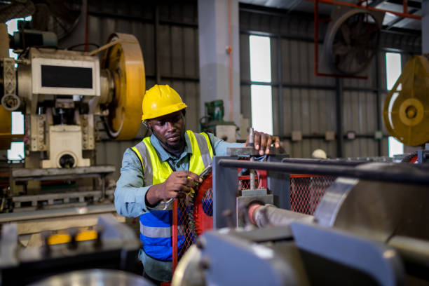 istock Team Foreman or Team worker work at factory site check up machine or products in site. Team Engineer or Team Technician checking Material or Machine on Plant. Heavy industry factory concept. 1390440216