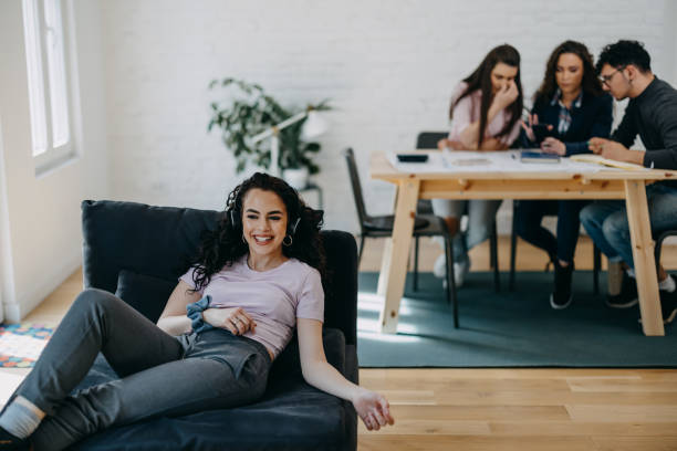 istock Group of students studying at home for their examand 1390440409