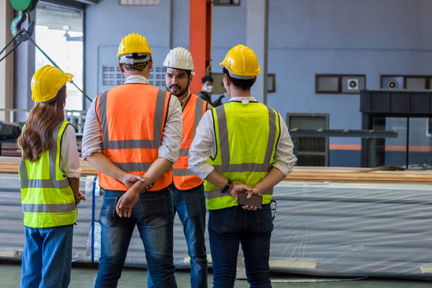istock Foreman or worker work at factory site check up machine or products in site. Engineer or Technician checking Material or Machine on Plant. Industrial and Factory. 1390440497