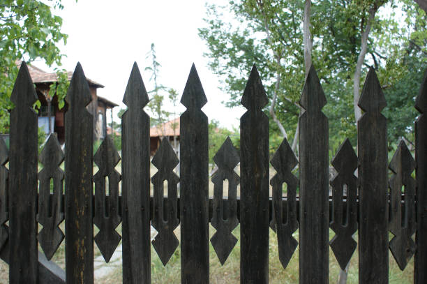 istock old village fence 1390446809