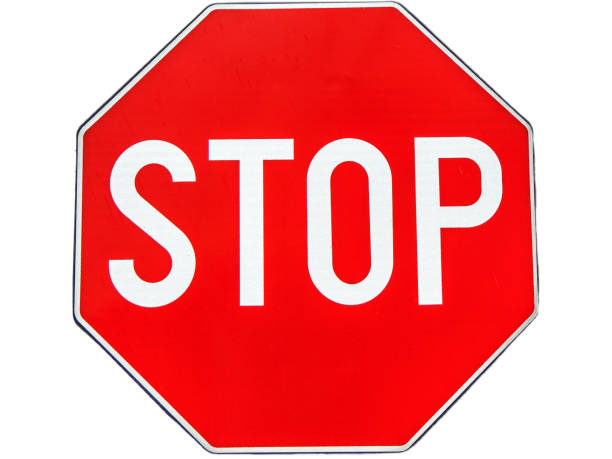 istock Stop traffic sign isolated on white background 1390447132