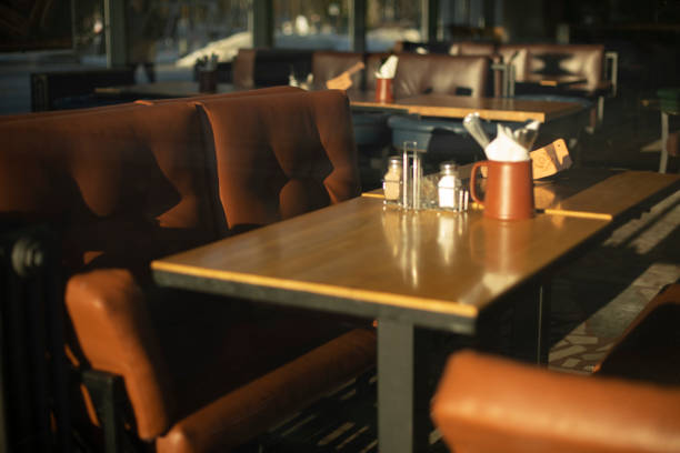 istock Table in restaurant. Place to relax. Brown sofa. Dining table. 1390447358