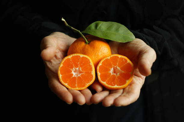 istock ripe and juicy tangerine (mandarin) 1390447409
