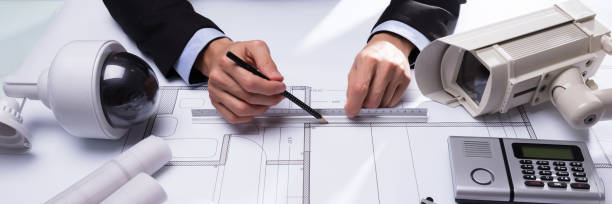 istock Close-up Of An Architect's Hand Drawing Blueprint 1390450540
