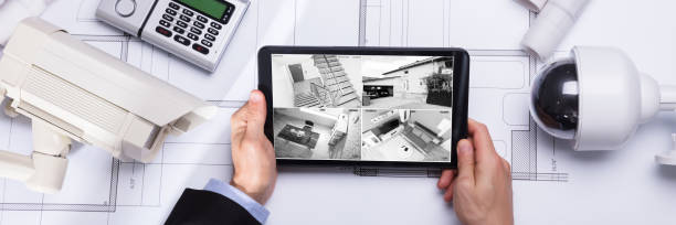 istock Person Watching Footage On Digital Tablet 1390450543