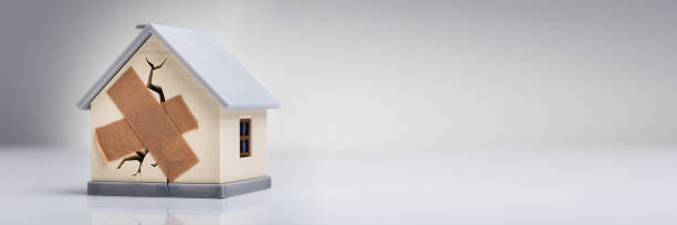 istock House Model With Crossed Band Aid 1390452240