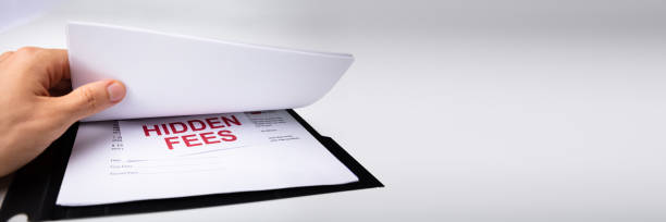 istock Person Looking At Hidden Fees In Contract 1390452324