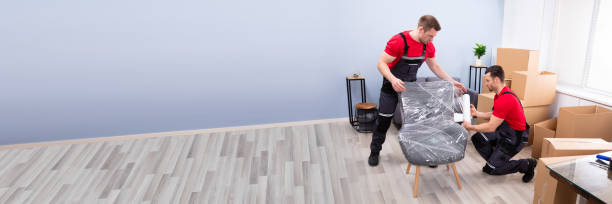 istock Men Packing The Chair With Plastic 1390452594