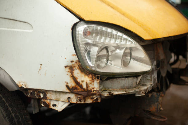 istock Car lamp. Rusty surface of machine. Old transport. 1390452629