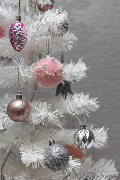 istock fragment of a miniature artificial Christmas tree decorated with toys 1390452807