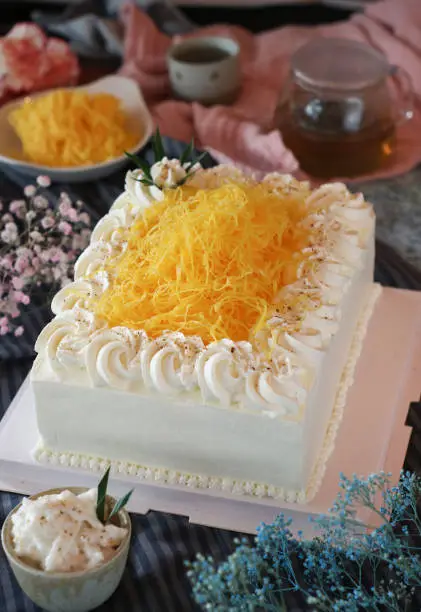 Photo of A chiffon sponge pound cake with whipped cream fusion with Thai traditional golden egg yolk threads