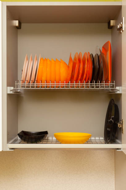 istock kitchen hanging cabinet shelves with colorful dishes 1390453619